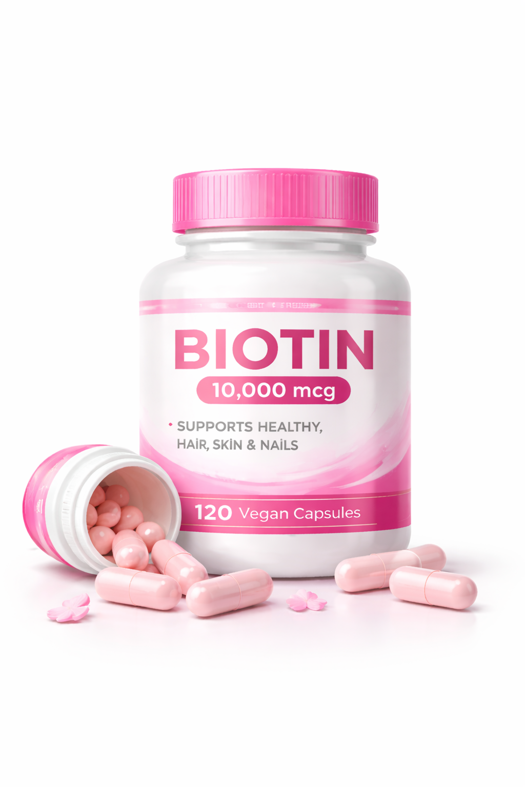 Pink-labeled biotin bottle, 10,000 mcg, 120 vegan capsules; several pink capsules spilled beside bottle