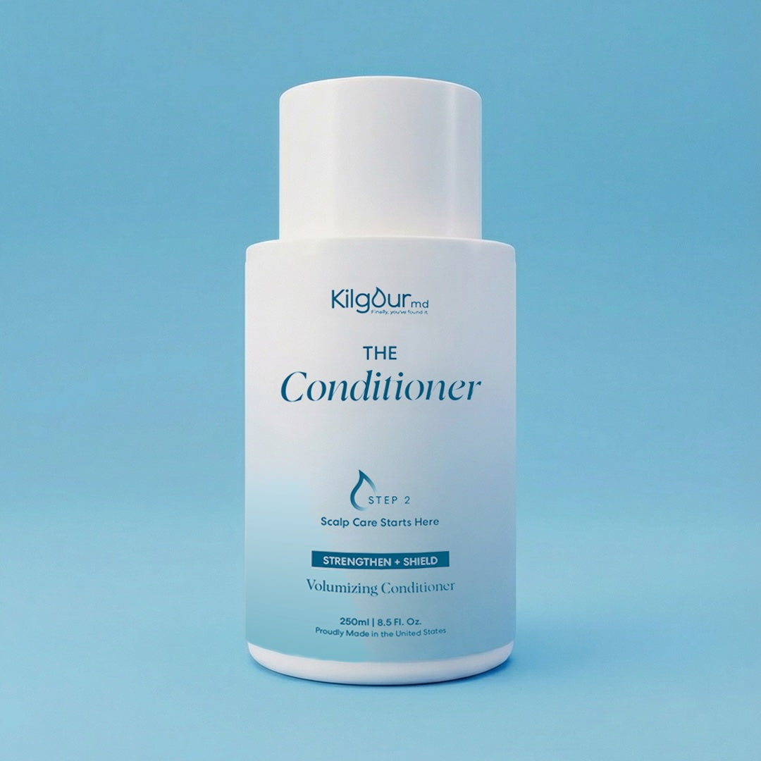 Kilgour MD The Conditioner bottle on a blue background